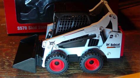 plush bobcat skid steer|bobcat scale model toys.